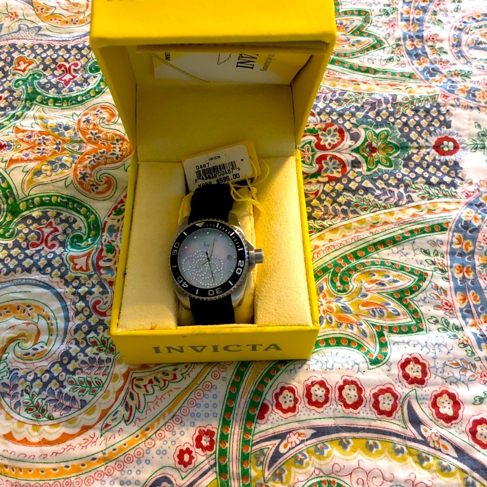 Invicta mother of pearl dial, cz rose on dial, black rubber belt